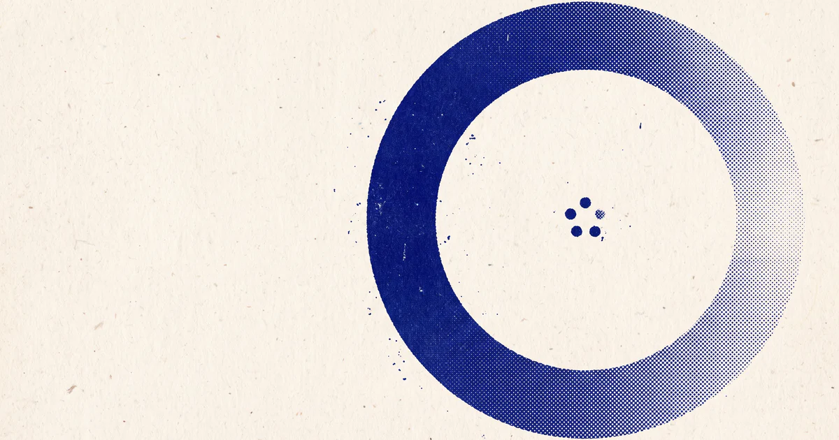 A huge blue ring on empty paper with five tiny dots suspended at its centre.